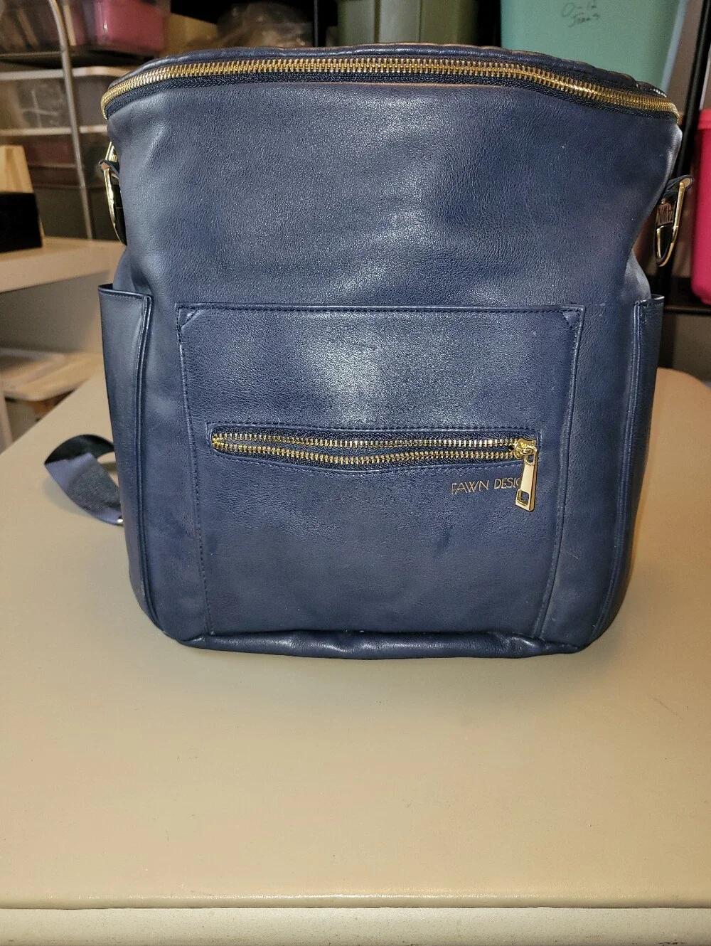 Fawn Design - Blue Bag/ Backpack Diaper Bag. Multi-pocketed Good Condition!